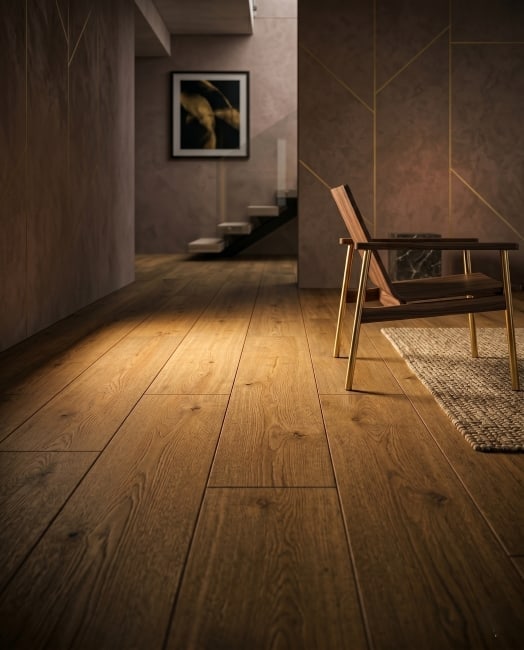 A macro close-up of dark walnut wood grain, highlighting rich swirling textures and deep chocolate tones.