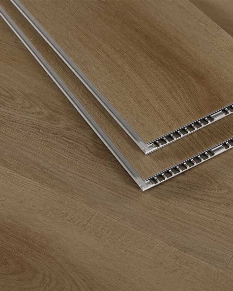 EVSPC planks stacked to reveal the hollow SPC core and 5G click locking edge