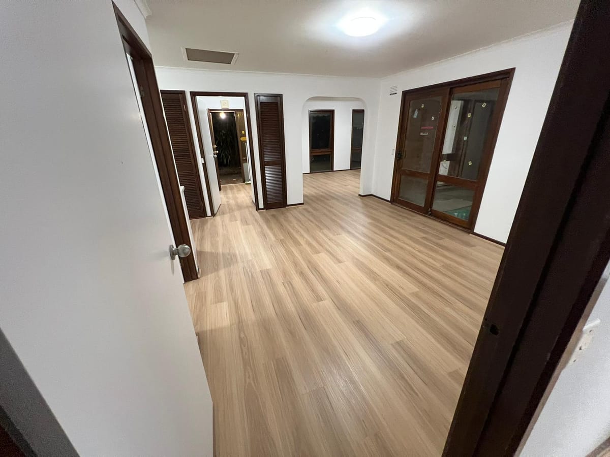Completed flooring on project 1002, photograph 1 of 6